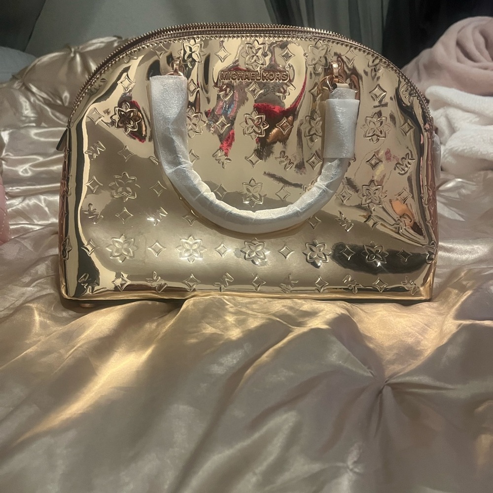 Rose gold Emmy Michael Kors handbag